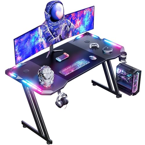 HLONONE 120 x 60 cm Gaming Tisch, Gaming Schreibtisch mit LED, PC Tisch Gaming mit Kohlefaseroberfläche, Stabiler Computertisch für Gaming mit Kopfhörerhaken und Getränkehalter, Schwarz